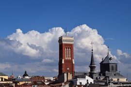 Church of the Santa-Cruz sitting on the rooftops.